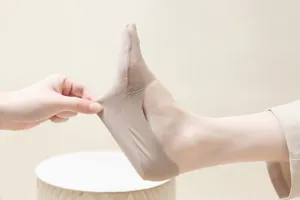 Close-up of women's mesh no-show boat sock, showing elastic stretchy fabric and breathable toe.