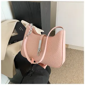 Rosa strukturierte Damen Umhängetasche, schicke minimalistische Handtasche mit Metallschloss.