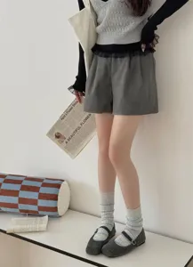 Detailed shot of thick warm color-block stripe socks with cozy daily outfit style.