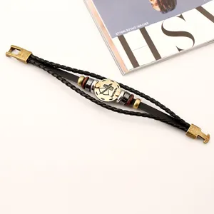 Pulsera de zodiaco trenzada de cuero retro para hombre con dije de metal y cuentas de madera.