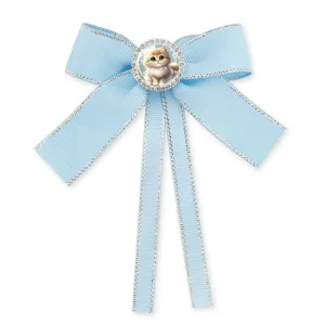 Süße blaue Schleife für Kinder, mit glitzernden Strasssteinen und niedlichem Katzenmotiv.
