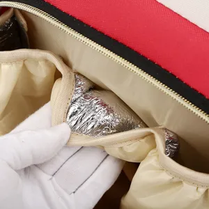 Sac à langer multifonctionnel pour maman avec grande capacité et compartiments isothermes.
