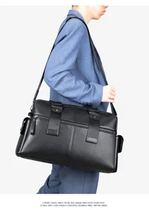 Vue détaillée du sac de voyage en cuir noir pour homme, design rétro avec bandoulière et anses.