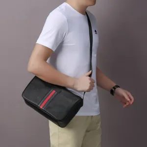 Stylish black leather mens shoulder bag with red and blue center stripe for casual daily use.