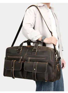 Sac de voyage vintage en cuir véritable de grande capacité avec plusieurs poches pratiques.