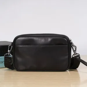 Men genuine leather shoulder bag detail view, black crossbody small square bag with zipper.