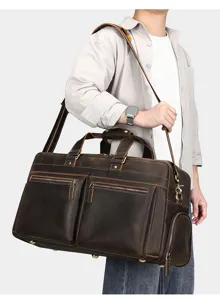 Sac de voyage en cuir de grande capacité pour homme, style vintage rétro en détail.