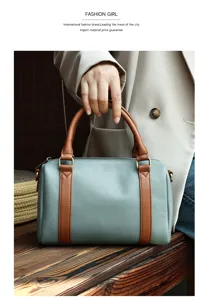 Classic leather boston handbag for women, stylish top handle shoulder bag with retro design.