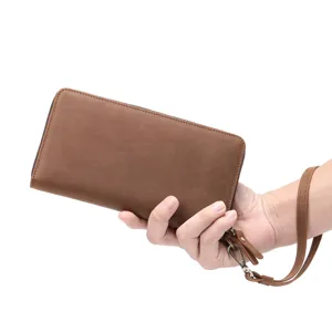 Men's brown leather business casual clutch wallet with wrist strap main product view.