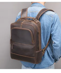 Close-up back view of men vintage crazy horse leather backpack casual travel business bag.