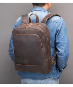 Detailed view of a vintage crazy horse leather backpack for men, premium cowhide travel bag.
