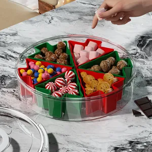 Plateau à snacks rotatif de Noël avec design à 360 degrés, compartiments étoiles et couvercle étanche.