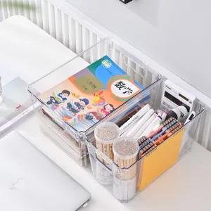 Scatola portaoggetti da scrivania in plastica trasparente per libri e articoli di cancelleria.