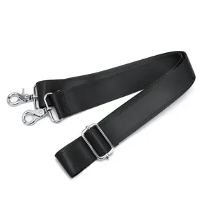 Correa de hombro de repuesto ajustable para bolsos con nailon negro y ganchos de metal resistentes.