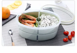 Porta pranzo ovale a doppio strato dettaglio, contenitore per alimenti diviso con coperchio.