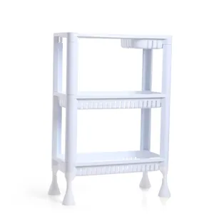 White plastic 3-tier storage shelf utility cart for kitchen bathroom organization.