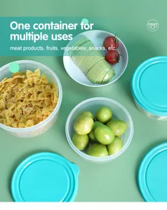 Set di contenitori per alimenti rotondi trasparenti con coperchio blu per cucina.