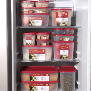 Contenitori per alimenti in plastica con coperchi rossi, organizer ermetici per frigorifero.