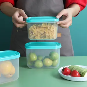 Clear plastic food storage container set with turquoise lids, ideal for kitchen fridge organization.