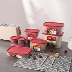 Frischhalteboxen Set mit roten Deckeln und transparenten Behaeltern fuer die Kueche.