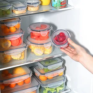 Clear plastic food storage containers set with airtight lids for refrigerator and kitchen organization.