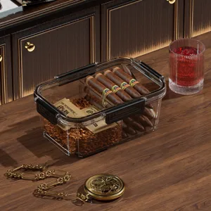 Boîte humidor à cigares en plastique transparent avec séparateur et sachet humidificateur.