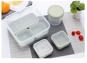 Detailed view of the 7-piece plastic meal prep container set with compartments and lids.