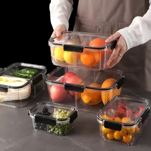 Clear plastic refrigerator storage box with compartments and sealing lid for food freshness.