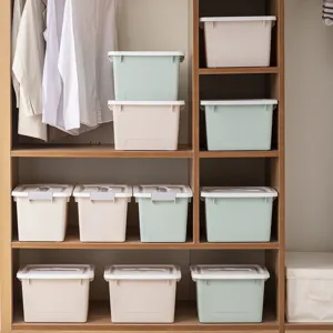 Plastic storage box with lid, stackable organizer bin for wardrobe and home use.