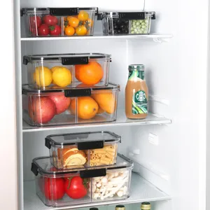 Clear plastic refrigerator storage boxes with lids, compartmentalized kitchen food organizers for fresh-keeping.