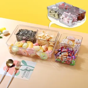 Boîte de stockage transparente avec compartiments, idéale pour le garde-manger et le réfrigérateur.