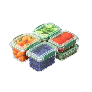 6-piece clear food storage container set with green lids for fridge fruit and veg organization.