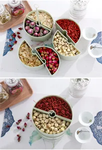 Contenitore di plastica a scomparti multipli per snack frutta secca e organizzazione cucina.