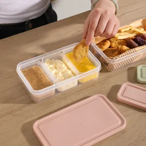 Plastic food storage container with multi compartments and lid, ideal for meal prep and snacks.