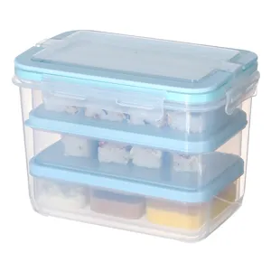 Clear plastic food storage container with blue lid rectangular lunch box for kitchen meal prep