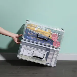 Clear plastic storage box for home organization, stackable toy and snack organizer container.