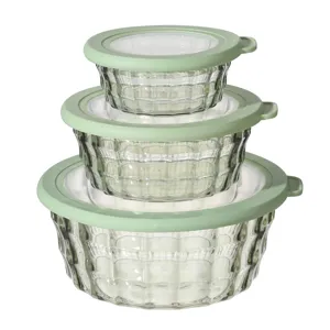 Set of 3 round glass salad bowls with green airtight plastic lids for fresh keeping food.