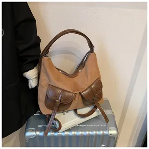 Vintage motorcycle style women's retro shoulder bag casual commuter tote bag with double front pockets.