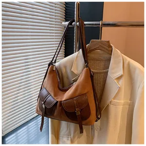 Vintage women brown suede backpack large capacity casual commuter shoulder bag detail view.