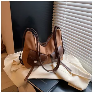 Retro motorcycle style women's canvas backpack detail view, versatile retro commuter large bag.