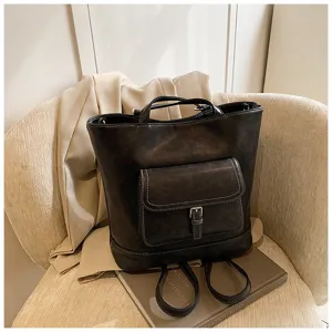 Zaino e borsa shopper in pelle scura vintage da donna, elegante zainetto casual giornaliero.