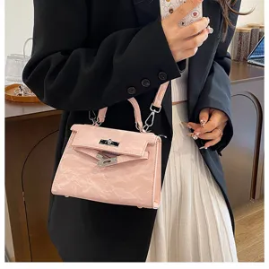 Bolso de cuero rosa para mujer, elegante bolso de mano cruzado con cierre metálico.