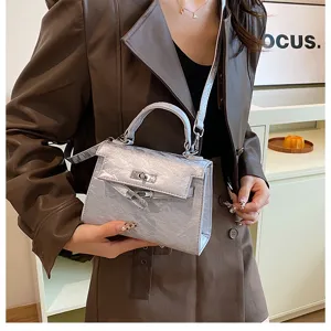 Bolso de mano texturizado plateado bandolera mujer elegante moda bolso kelly detalle