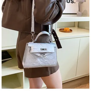Bolso Kelly texturizado metálico plateado para mujer, elegante bolso de hombro y cruzado.