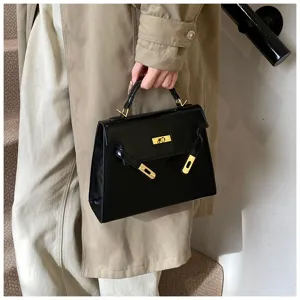 Sac a main noir pour femme, design retro avec poignee superieure, sac bandouliere elegant mode.