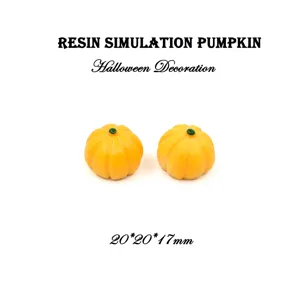 Vue détaillée de citrouilles miniatures en résine jaune, dimensions 20x20x17mm