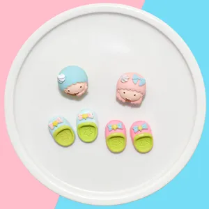 Detailed view of miniature pastel resin slippers and character DIY accessories