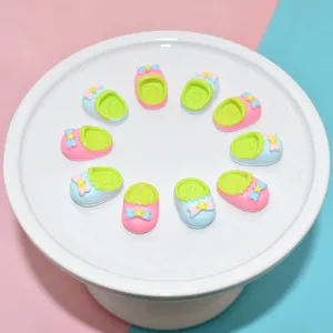 Macro view of ten colorful miniature resin slippers for DIY dollhouse and phone case crafts