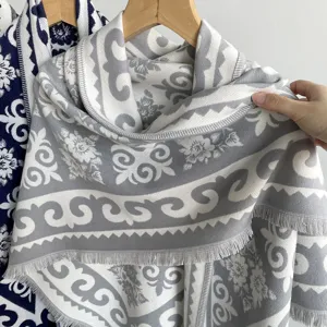 Cozy women's jacquard shawl featuring elegant vintage patterns and fringe edge for autumn.