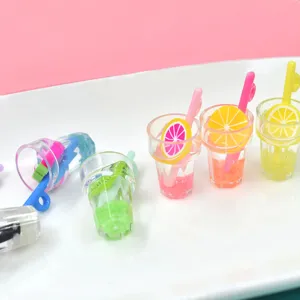 Detailed macro shot showing the vibrant colors and fruit slices inside miniature resin cups